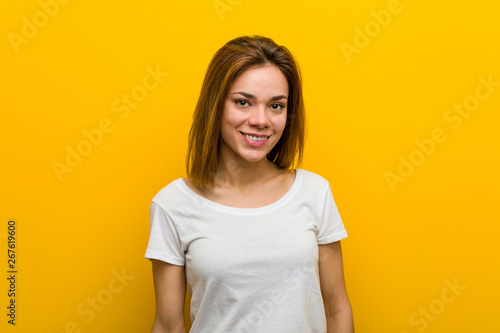 Young natural caucasian woman happy, smiling and cheerful.