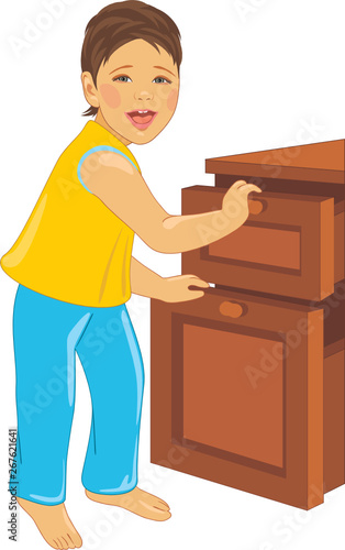 Laughing child opens the dresser