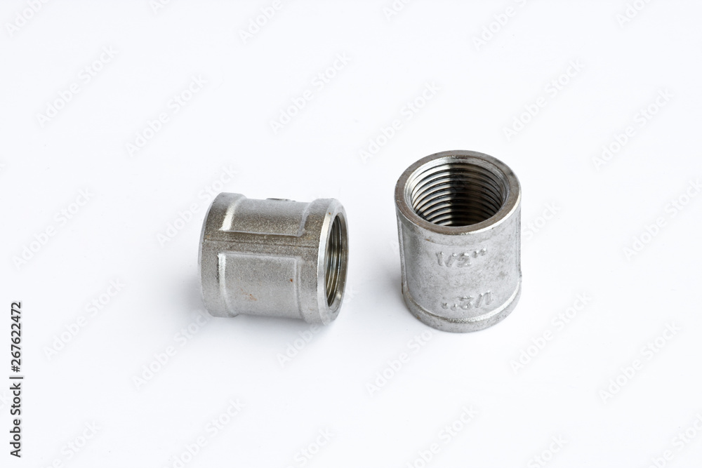Stainless steel fittings, threaded fitting for water and gas pipes. Isolated object. Stainless steel fittings, threaded fitting for water and gas pipes. Isolated object.