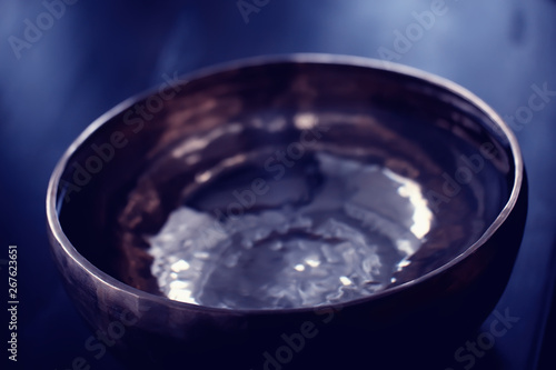 clear water in a golden bowl / clear water in a yellow iron bowl