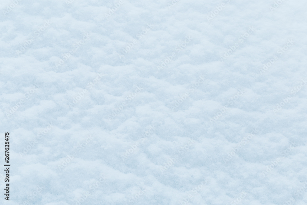Fototapeta premium background of fresh snow texture in blue tone