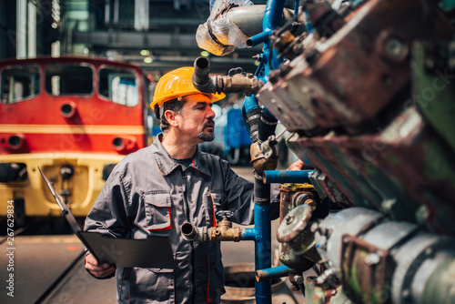 Supervisor at work in metal industry.