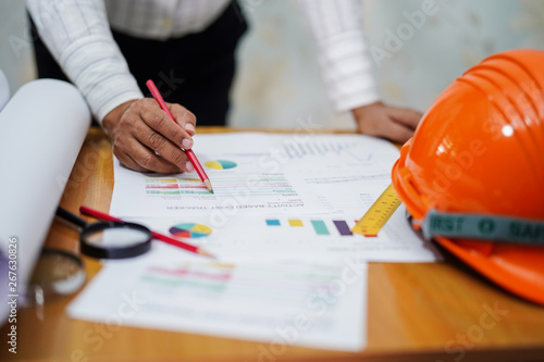 Architect or engineer working project with tools in office, Construction concept. 