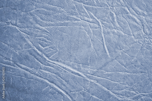 Colored skin texture, natural or faux leather background. Light blue leatherette, closeup.