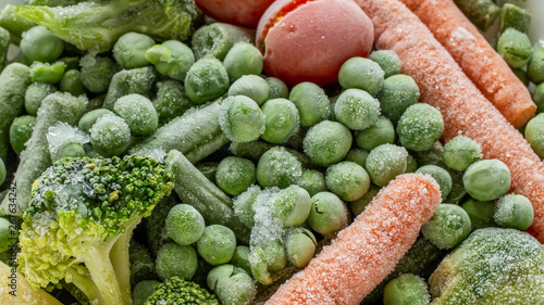 frozen vegetables: broccoli, cherry tomatoes, french bean, pea, carrot, top view