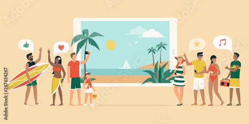 Cheerful people booking a tropical beach vacation online