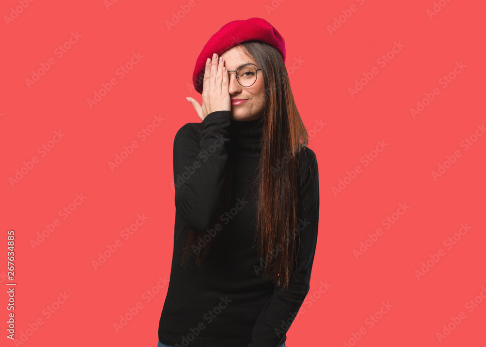 Young artist woman shouting happy and covering face with hand Young artist woman shouting happy and covering face with hand