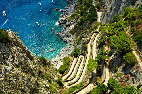 Aerial view of Via Krupp leading to the blue sea off the coast of the island of Capri, Italy