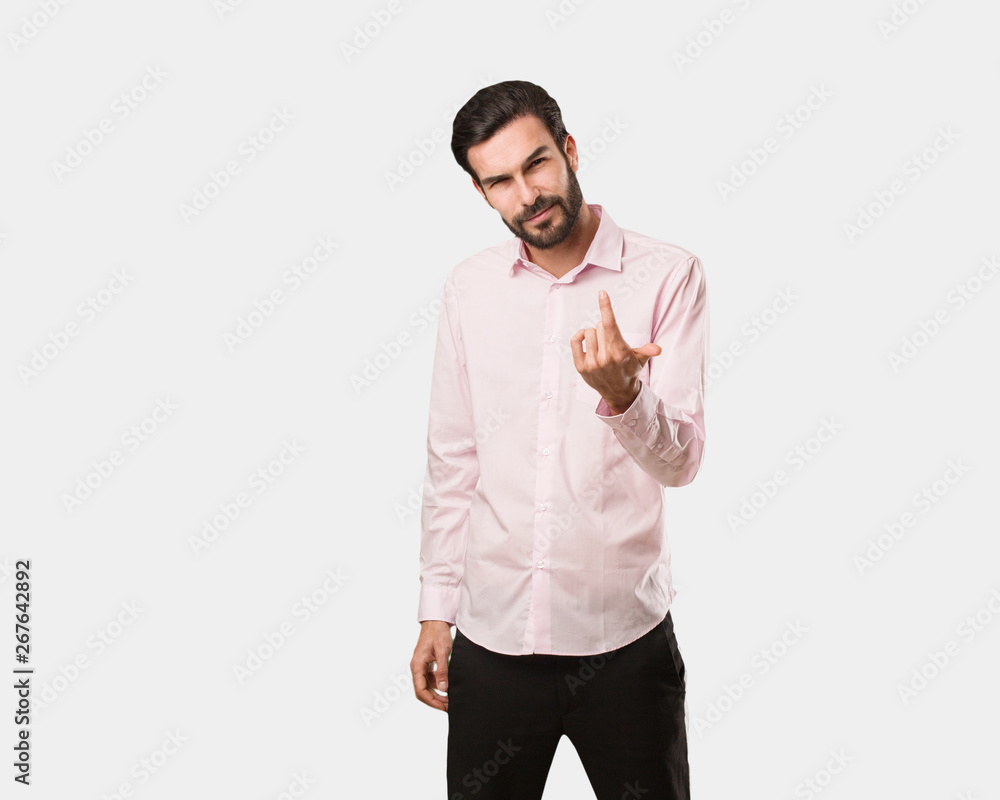 Young handsome man inviting to come Young handsome man inviting to come