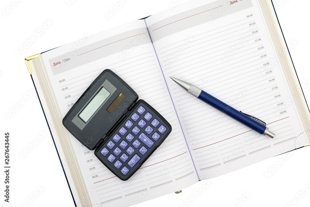 Calculator, pen and notebook on a white Calculator, pen and notebook on a white