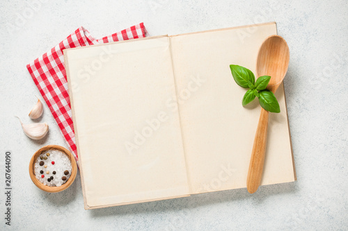 Photos Cooking concept with cookbook on kitchen table
