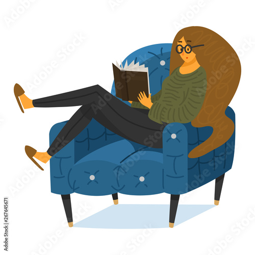 A fan of books a woman is sitting on the couch. Stylish literature lover with glasses.