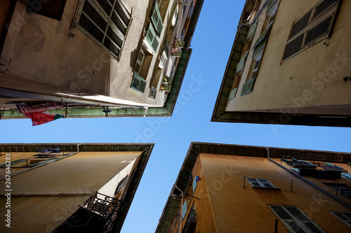 France, Nice, four facades in the old town seen from below photo