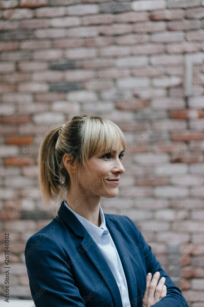 Portrait of successful businesswoman, looking confident Portrait of successful businesswoman, looking confident