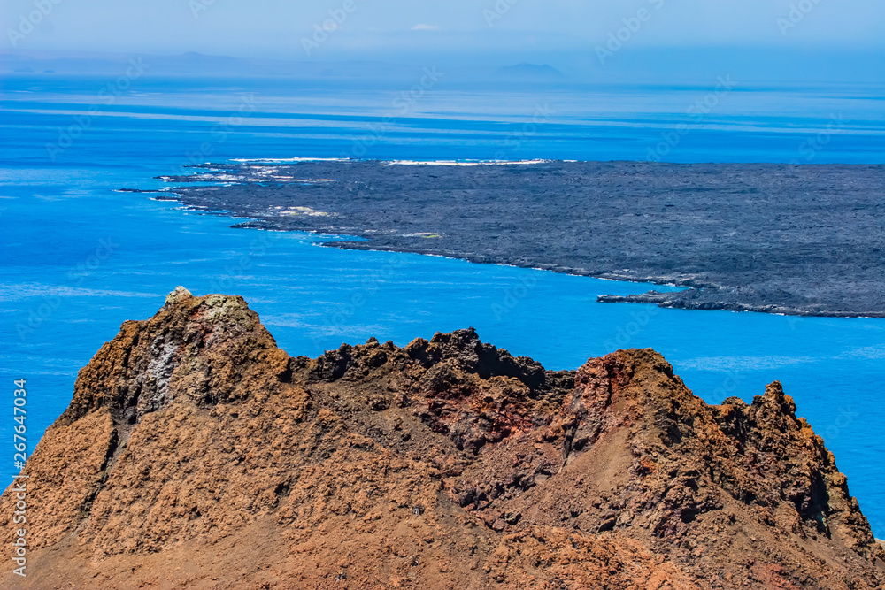 Galapagos islands. Ecuador. View from the crater to the lava fields. Bartolome island. Volcanic island San Salvador. Galapagos landscape. Ecuador travel.