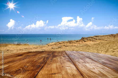 Summer day and wooden table background of free space. 