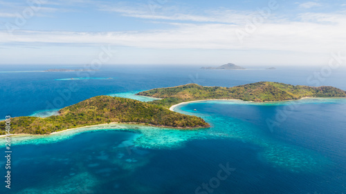aerial seascape tropical island with sand bar, turquoise water and coral reef. Ditaytayan, Palawan, Philippines. tourist boats on tropical beach. Travel tropical concept. Palawan, Philippines © Tatiana Nurieva