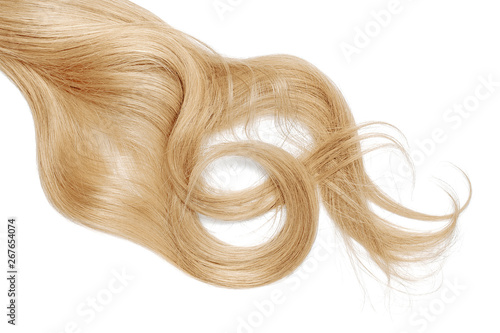 Disheveled blond hair isolated on white background. Long wavy ponytail