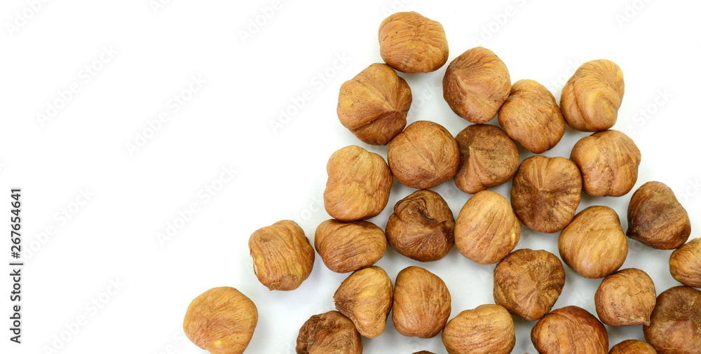 Heap of hazelnuts isolated on white background Heap of hazelnuts isolated on white background