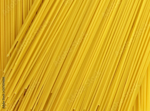 Spaghetti - yellow pasta, ready for cooking. isolated on the white background. uncooked spaghetti noodles. Uncooked whole wheat pasta. 