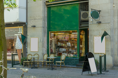 Ice cream store front by a cobblestone pedestrian street