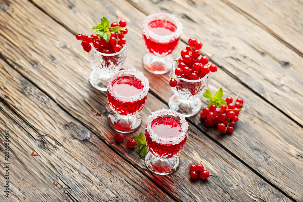 Red currant liquor with sugar and mint