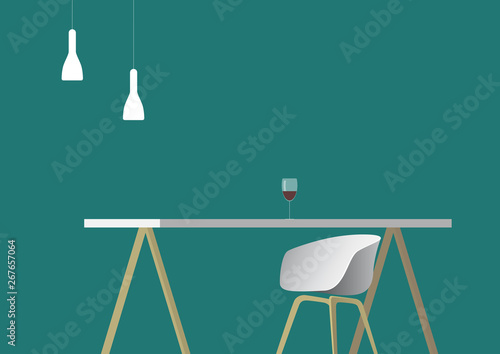 A wine glass surrounded by emerald walls