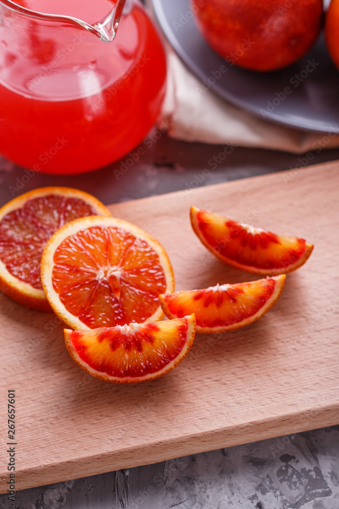 blood orange and juice on a dark background blood orange and juice on a dark background