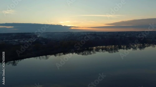Wallpaper Mural Romantic water landscape with sunset sky. Smooth surface of the wide river with reflection. Calm quiet weather. Aerial survey- flight of drone  Torontodigital.ca