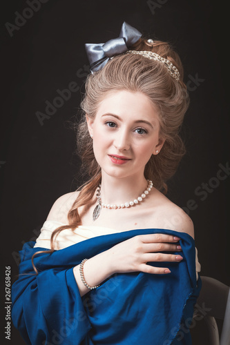 Woman in the Studio with a retro make-up and hairstyle in the style of painting by Thomas Gainsborough 