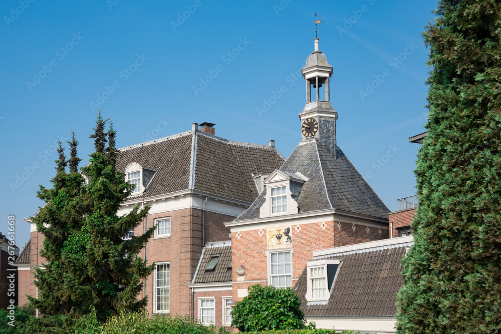 Fototapeta premium Gate Waterpoort with tower, clock and buildings, Tiel, The Netherlands