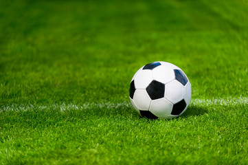 Black and white soccer ball in the field