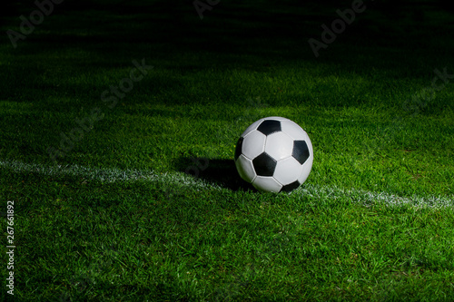 Black and white soccer ball in the field
