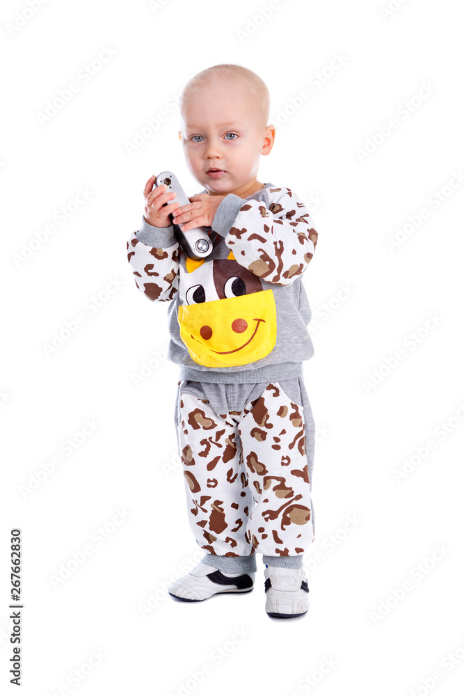 Little Kid boy dressed in cow costume with photocamera in hands. Isolated on white background Little Kid boy dressed in cow costume with photocamera in hands. Isolated on white background