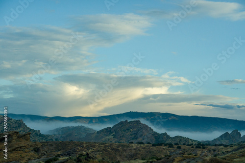 Fototapeta Naklejka Na Ścianę i Meble -  clouds over mountains