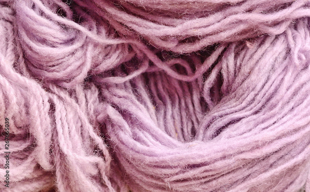 Fototapeta premium Color yarn for knitting, knitting wool balls . Beautiful yarn knitting background. Close up of multi colored kitting yarn.