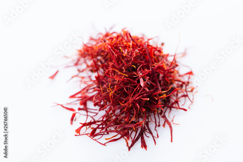 Close-up of saffron spice on white background