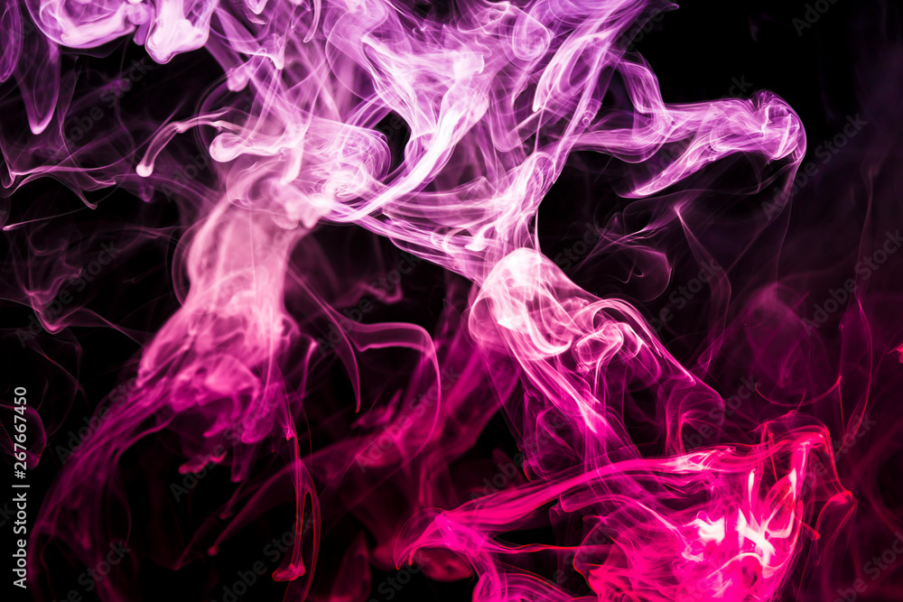 Colored smoke on black background Colored smoke on black background