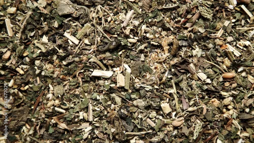 Green dried mix herbs background. Top view. Alternative herbal medicine Green dried mix herbs background. Top view. Alternative herbal medicine