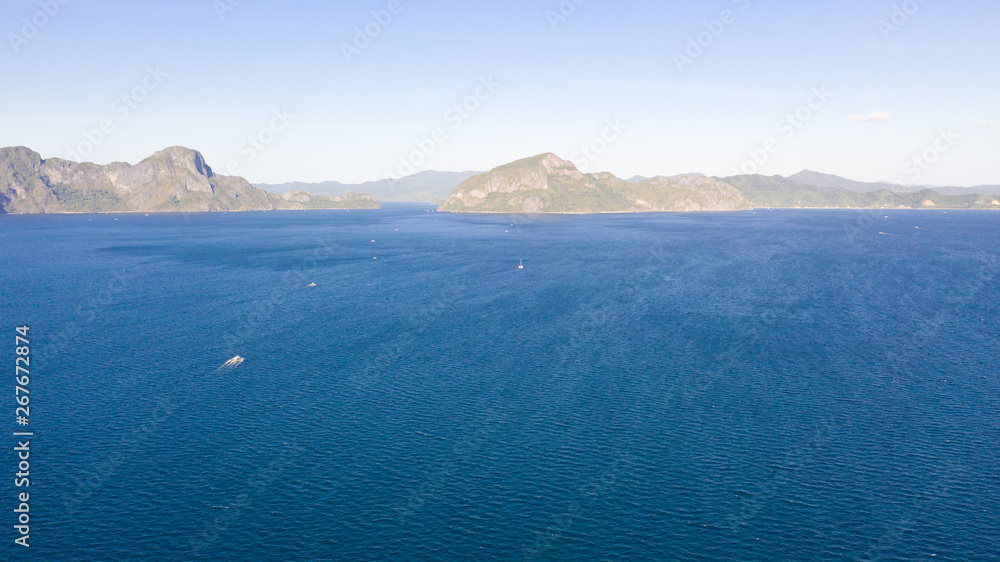 Seascape with islands.Blue Sea and unpopulated islands.Philippine Islands, a top view. Seascape with islands.Blue Sea and unpopulated islands.Philippine Islands, a top view.