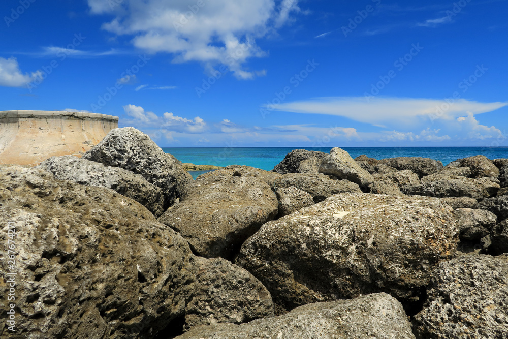Rocky Beach and blue cloudy skies in the Bahamas Rocky Beach and blue cloudy skies in the Bahamas