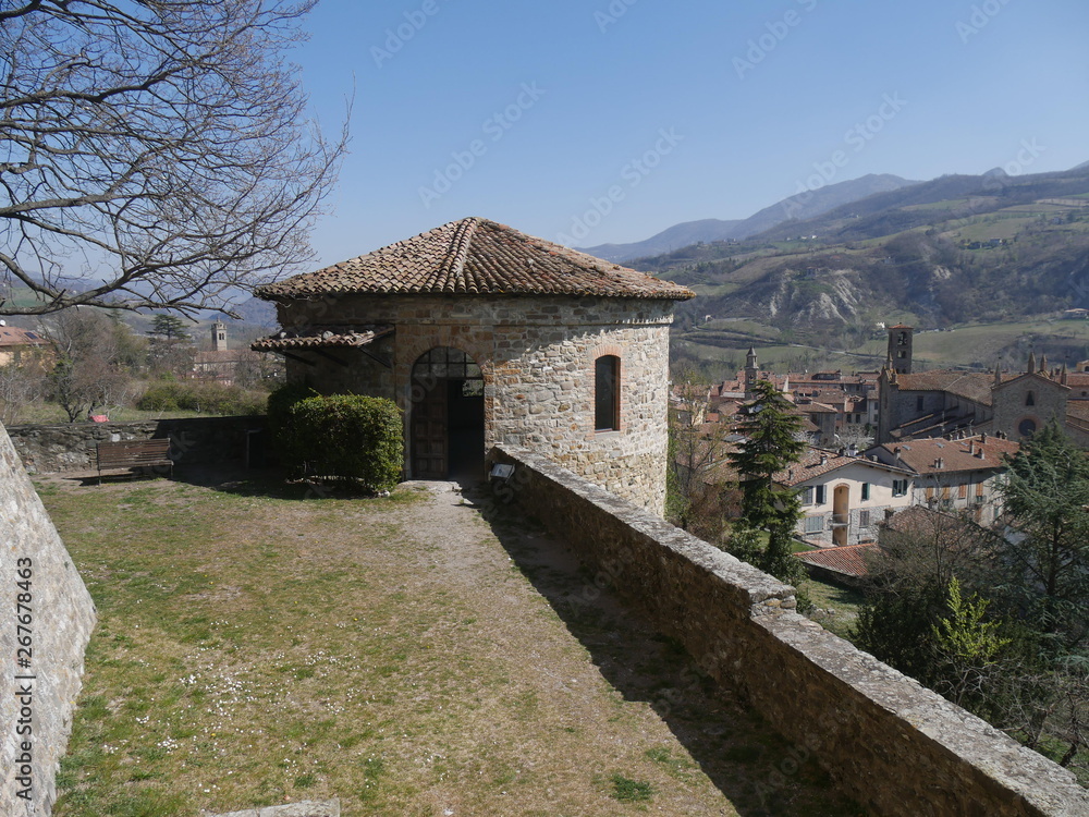 Malaspina Castle in Bobbio. It was built by Malaspina family as a fortress with a massive tower and it was later converted into a residence by Dal Verme family. It dominates the panorama of the Trebbi