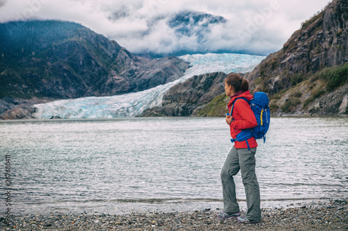 Alaska glacier tourist lifestyle in Juneau. Famous Mendenhall ice landscape summer travel destination. Cruise ship attraction.