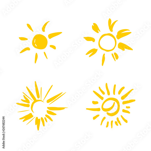 Four painted yellow suns. Vector solar symbols set.