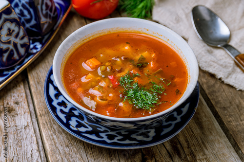 mastava Uzbek cuisine on wooden background