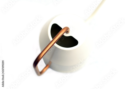 Modern Scandinavian white watering can with gold handle