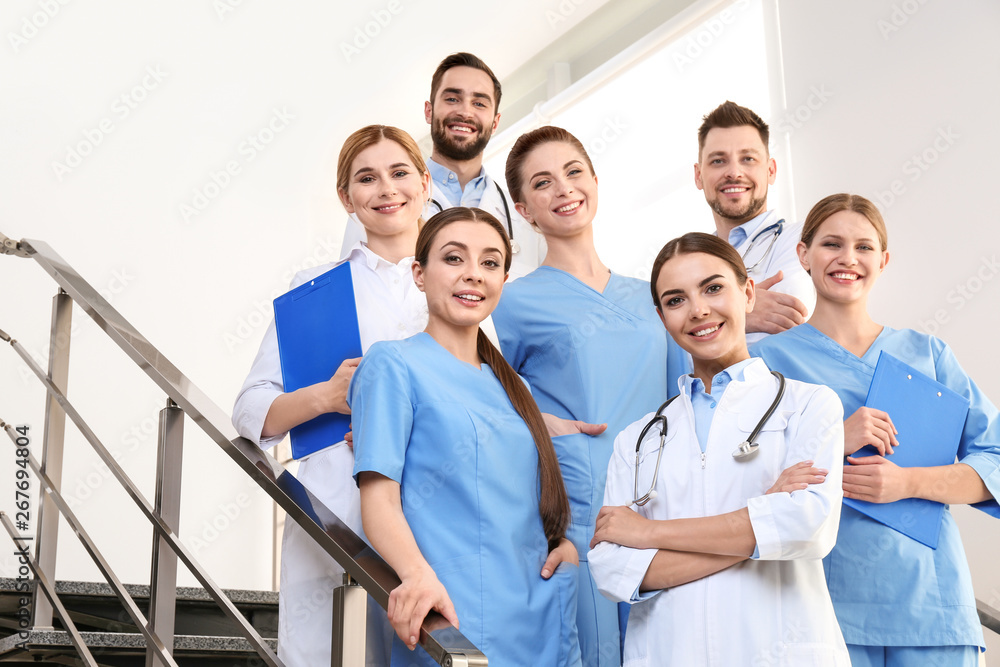 Group of medical doctors at clinic. Unity concept Group of medical doctors at clinic. Unity concept