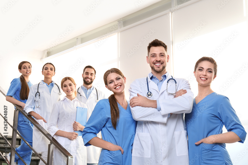 Group of medical doctors at clinic. Unity concept Group of medical doctors at clinic. Unity concept