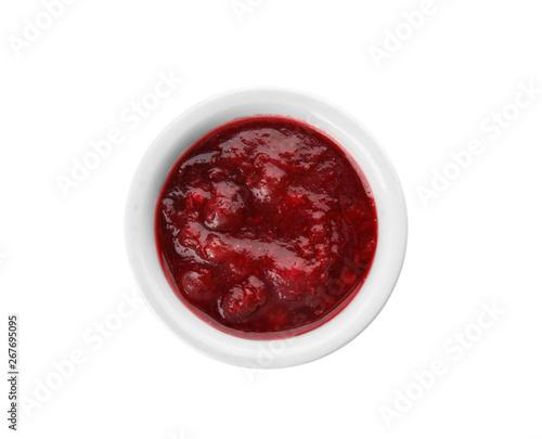 Bowl of cranberry sauce on white background, top view