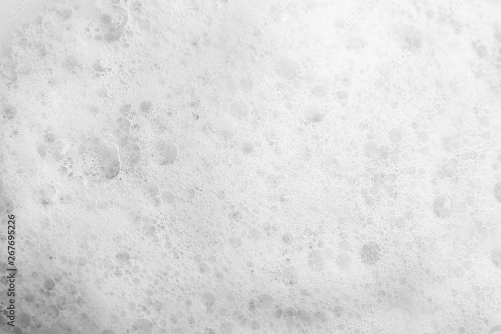 Soft white soap foam as background, closeup Soft white soap foam as background, closeup